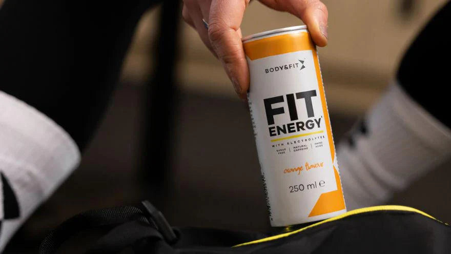 Body&Fit Fit Energy Drink being taken out of a gym bag.