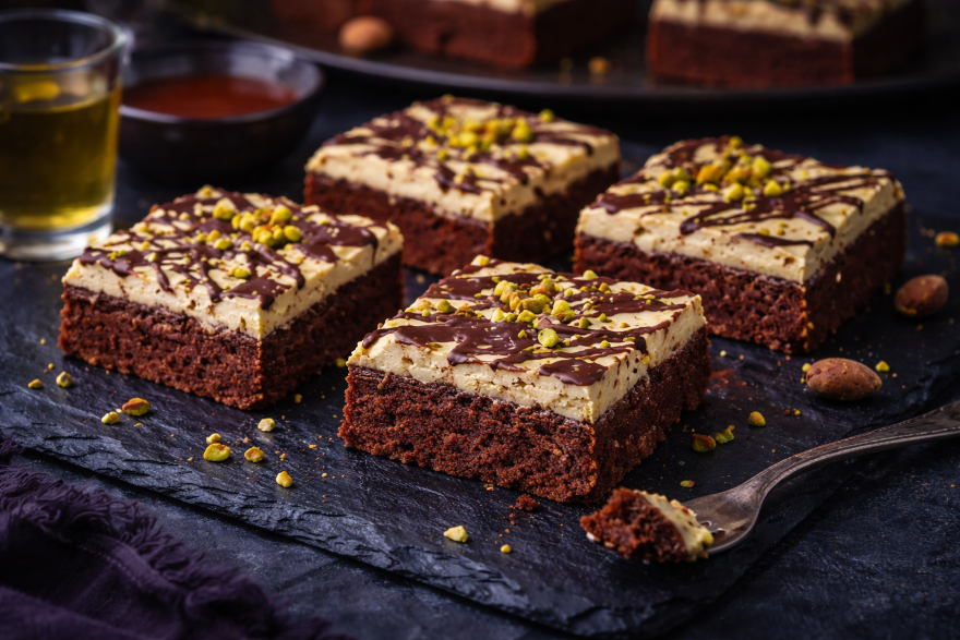 Chocolate brownies topped with pistachios and drizzle, inspired by Dubai-style desserts